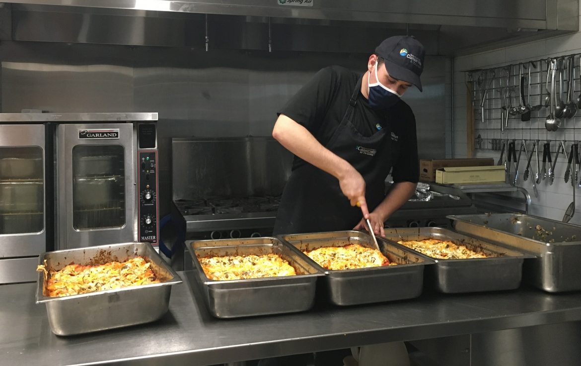 TRCA team member prepares food to help support vulnerable communities in Peel and York Regions