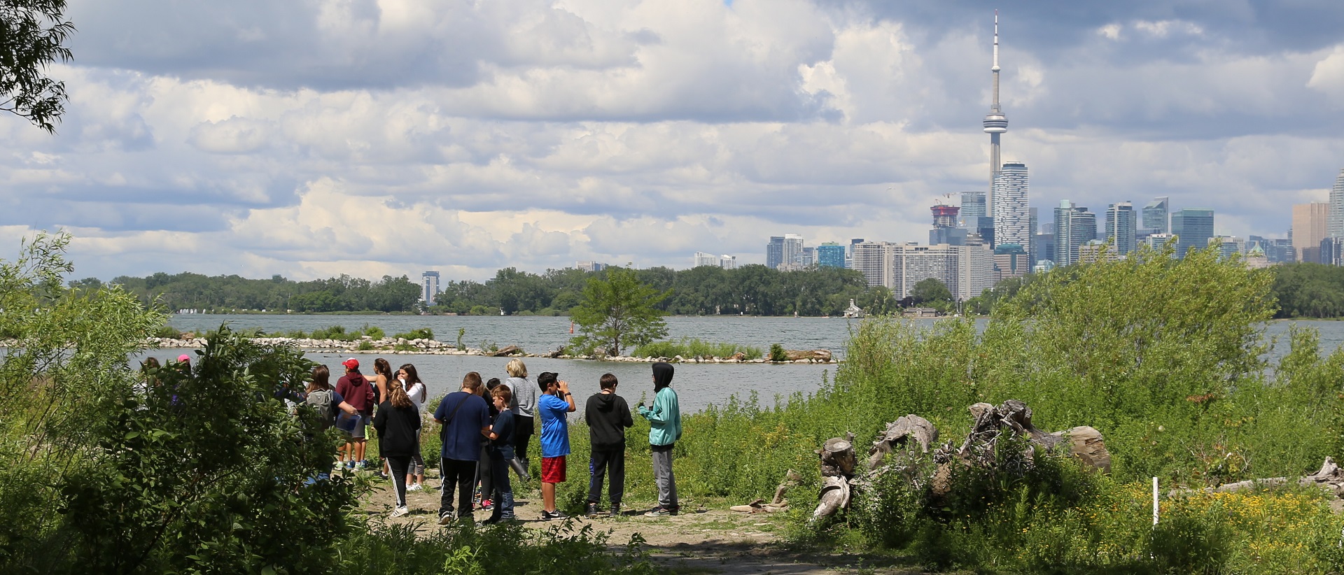 students on field trip explore the urban wilderness of Tommy Thompson Park