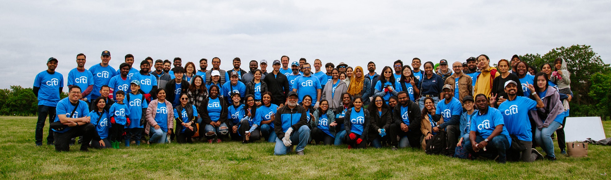 a corporate team takes part in a Look After Where You Live community stewardship event