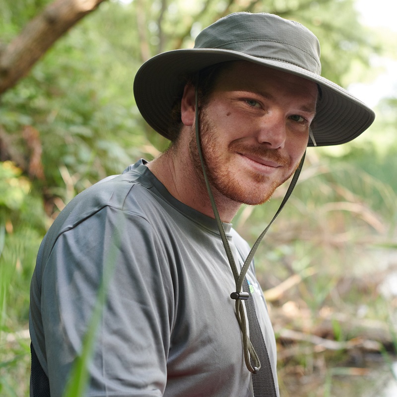 an ecosystems researcher conducts monitoring field work